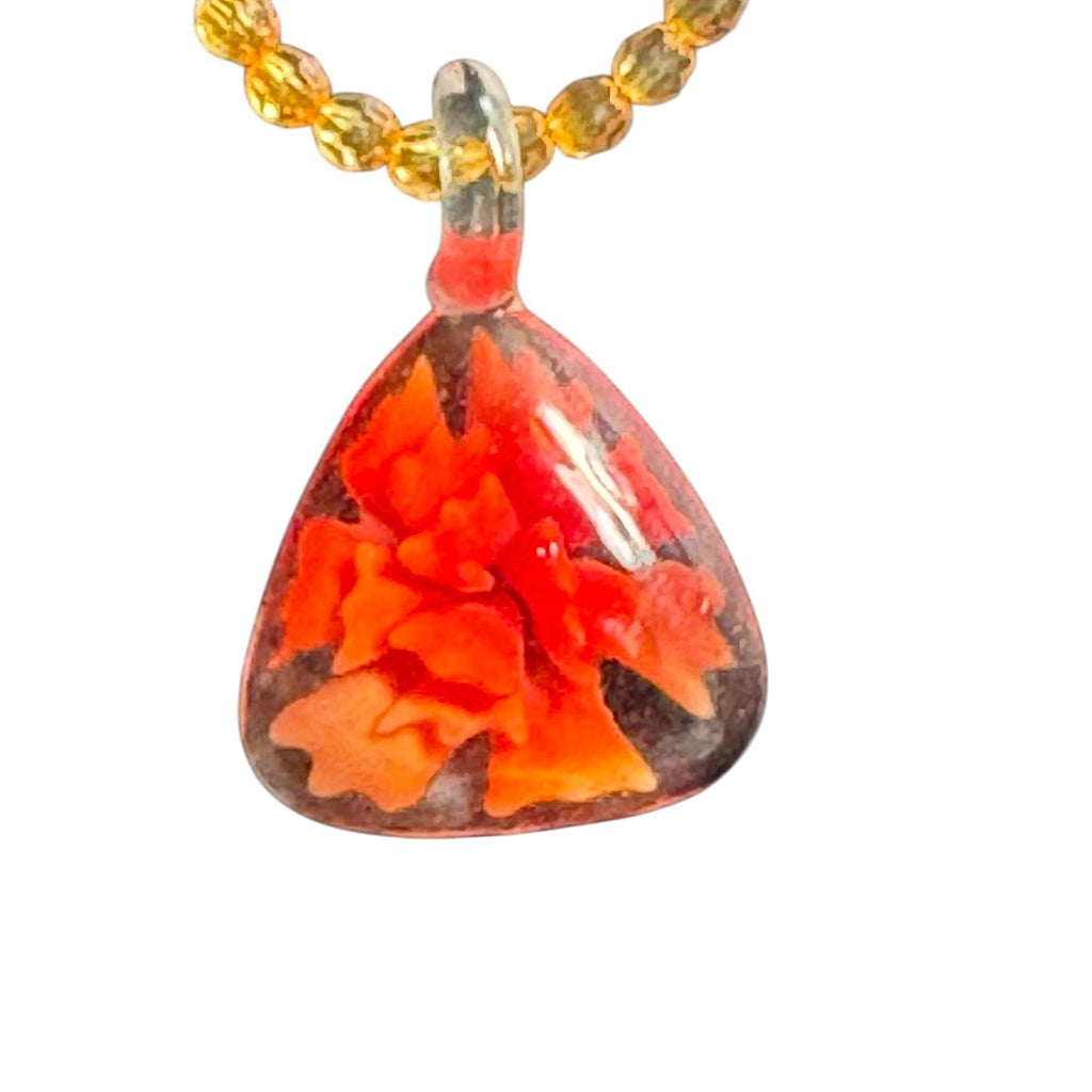 Handcrafted Orange Glass Pendant Necklace With Artful Floral Design & Bead Accents