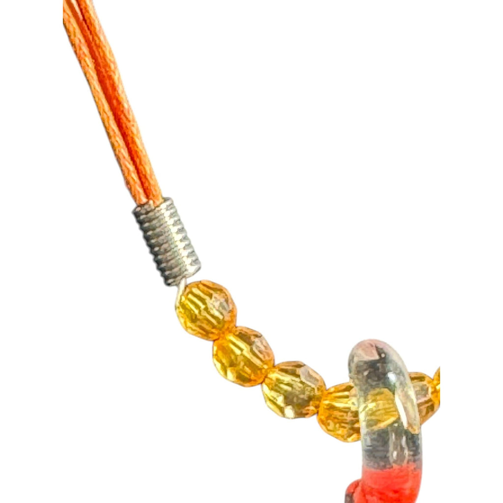 Handcrafted Orange Glass Pendant Necklace With Artful Floral Design & Bead Accents