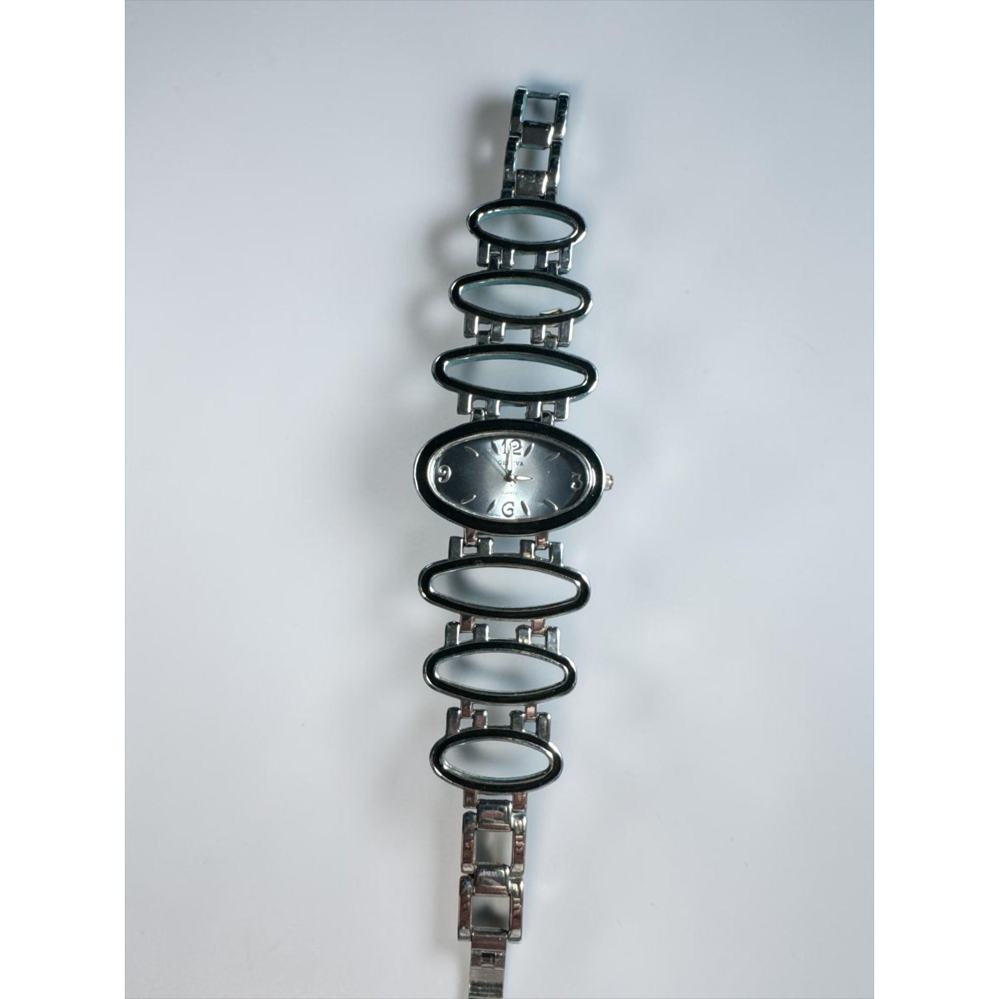 Geneva Quartz Womens Oval Silver-Tone Bracelet Watch With Unique Open-Link Design