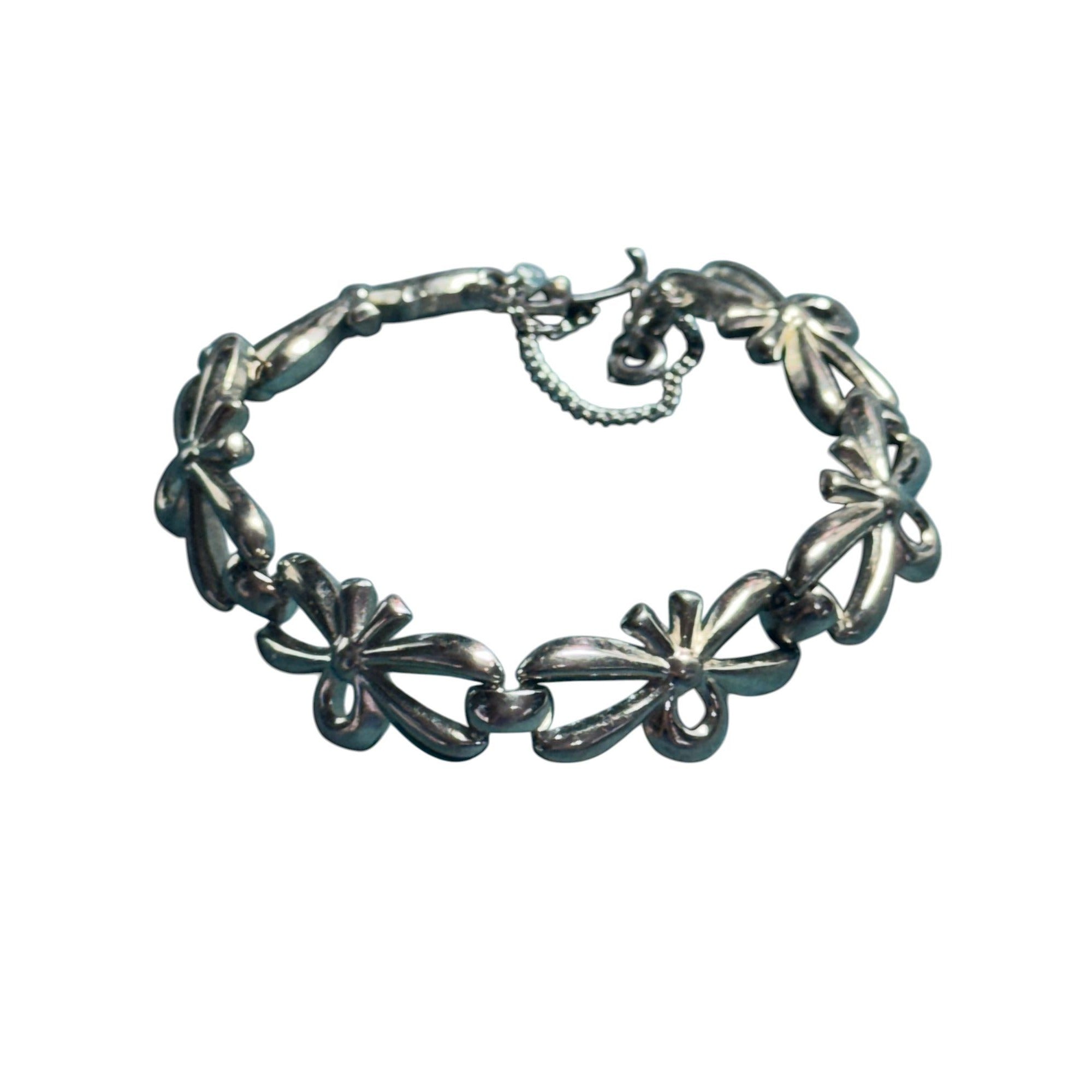 Vintage Monet Silver-Tone Bow Link Bracelet With Safety Chain 7-Inch Elegant Design