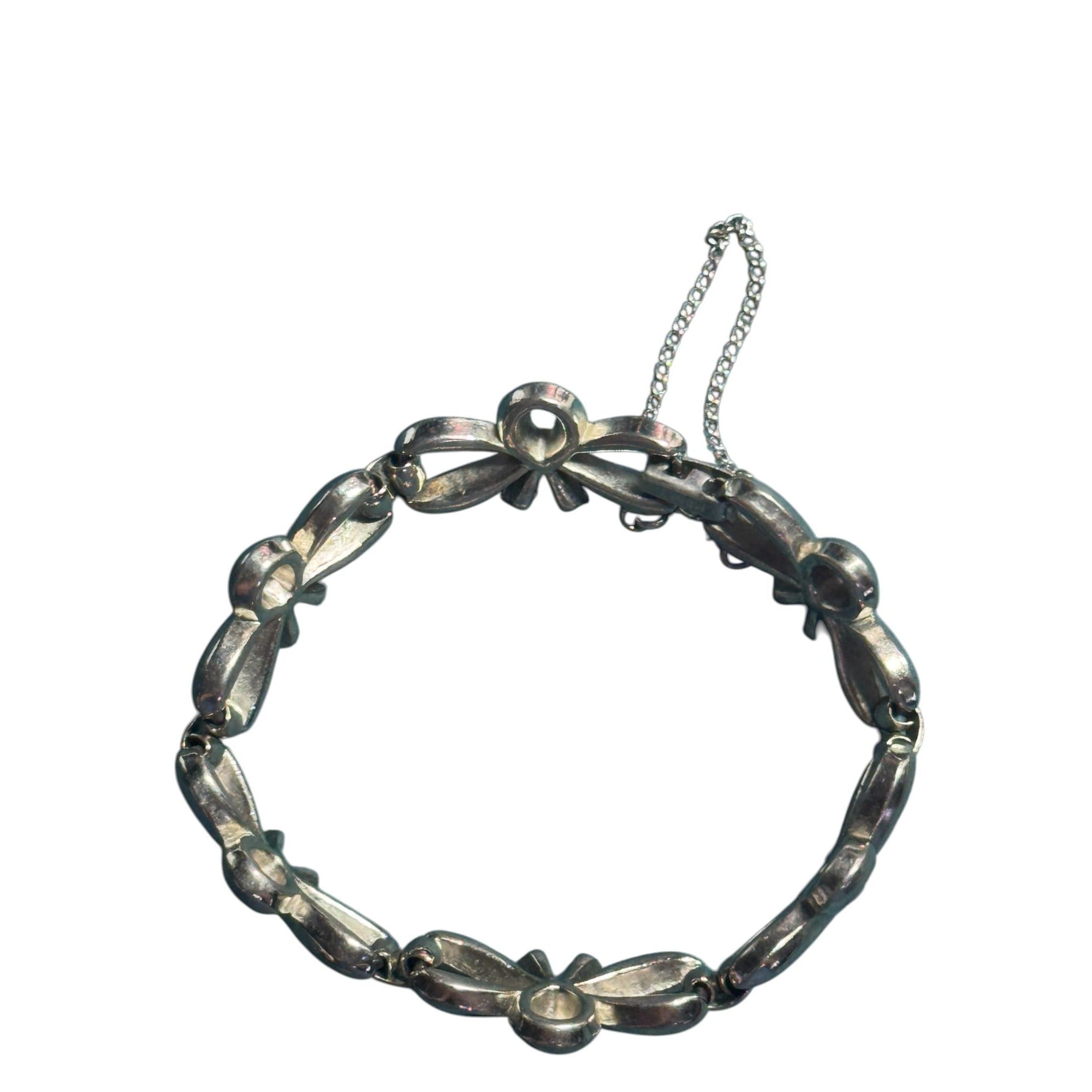 Vintage Monet Silver-Tone Bow Link Bracelet With Safety Chain 7-Inch Elegant Design
