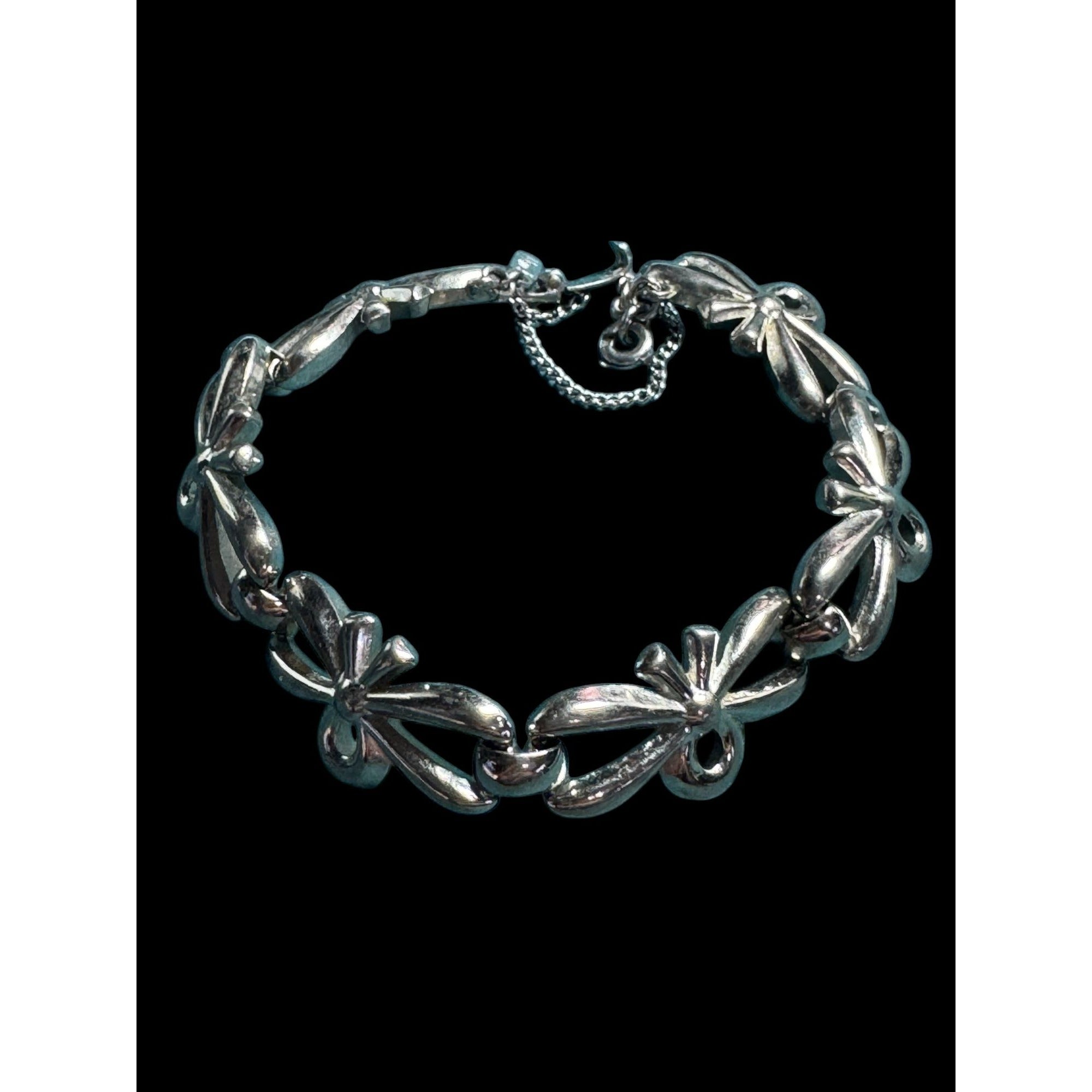 Vintage Monet Silver-Tone Bow Link Bracelet With Safety Chain 7-Inch Elegant Design