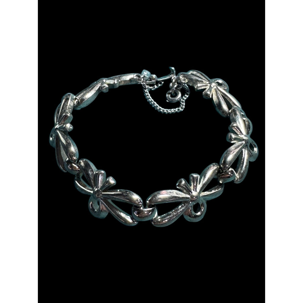 Vintage Monet Silver-Tone Bow Link Bracelet With Safety Chain 7-Inch Elegant Design