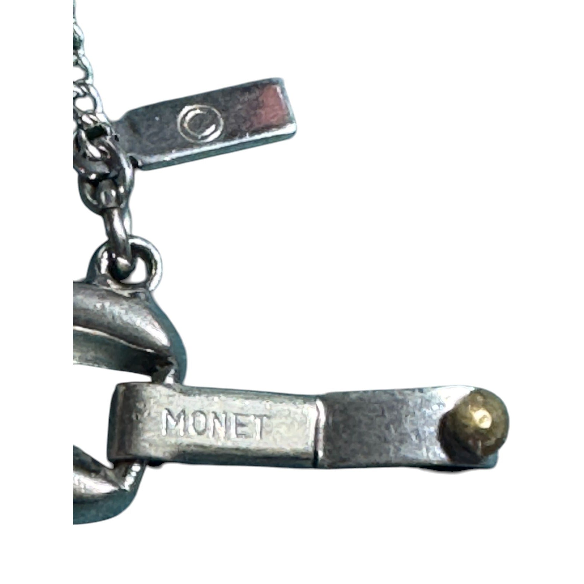 Vintage Monet Silver-Tone Bow Link Bracelet With Safety Chain 7-Inch Elegant Design